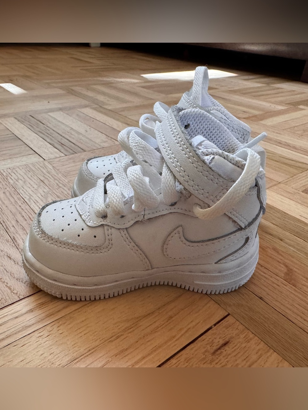 Nike White Kids High-Top Sneakers with Subtle Gray Accents